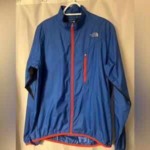 The North Face Men's Blue Windbreaker with Red Accents